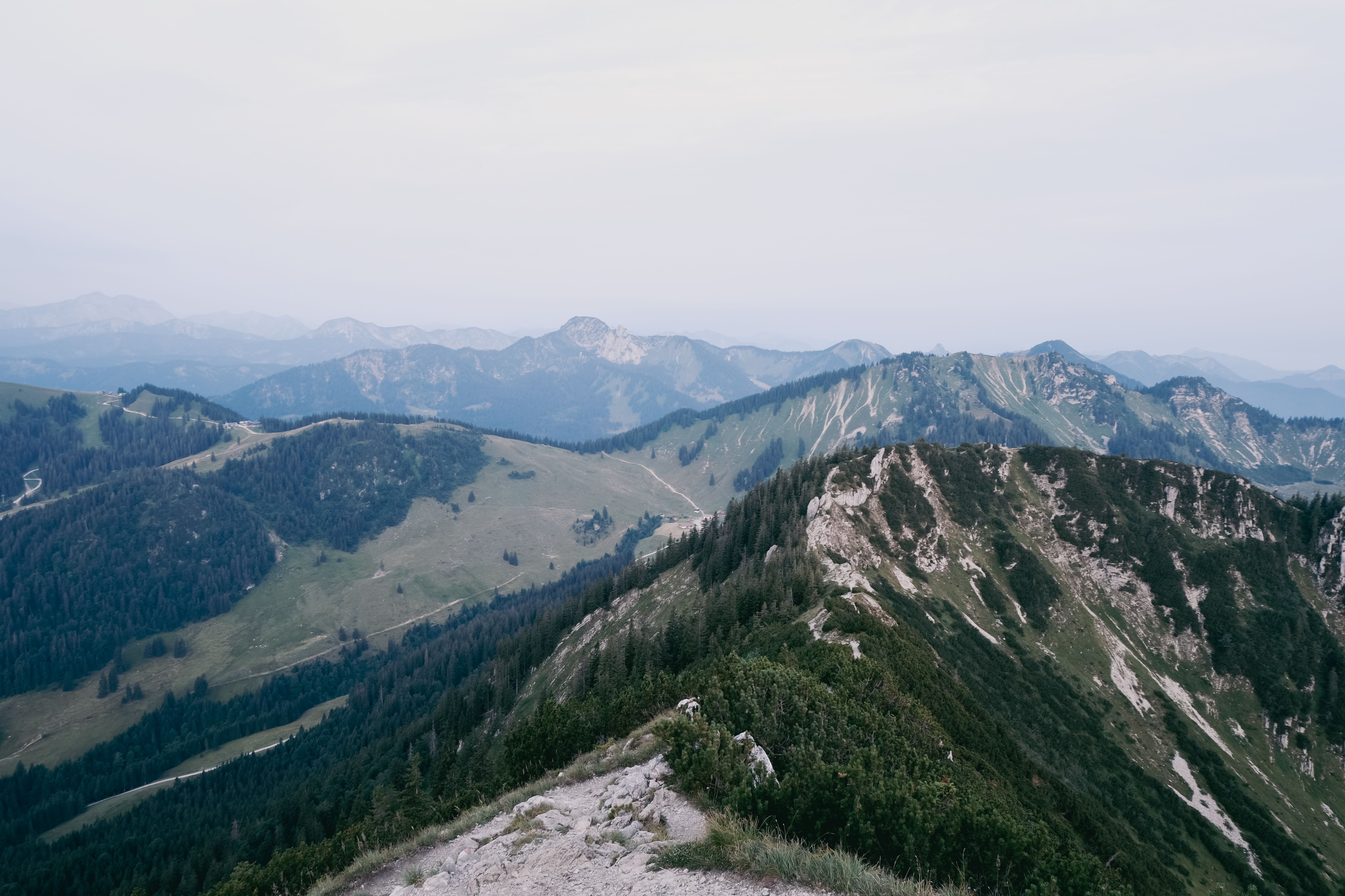 Green peaks of the Bavarian Alps near Kempten, Germany, setting the scene for a mountain spa escape.