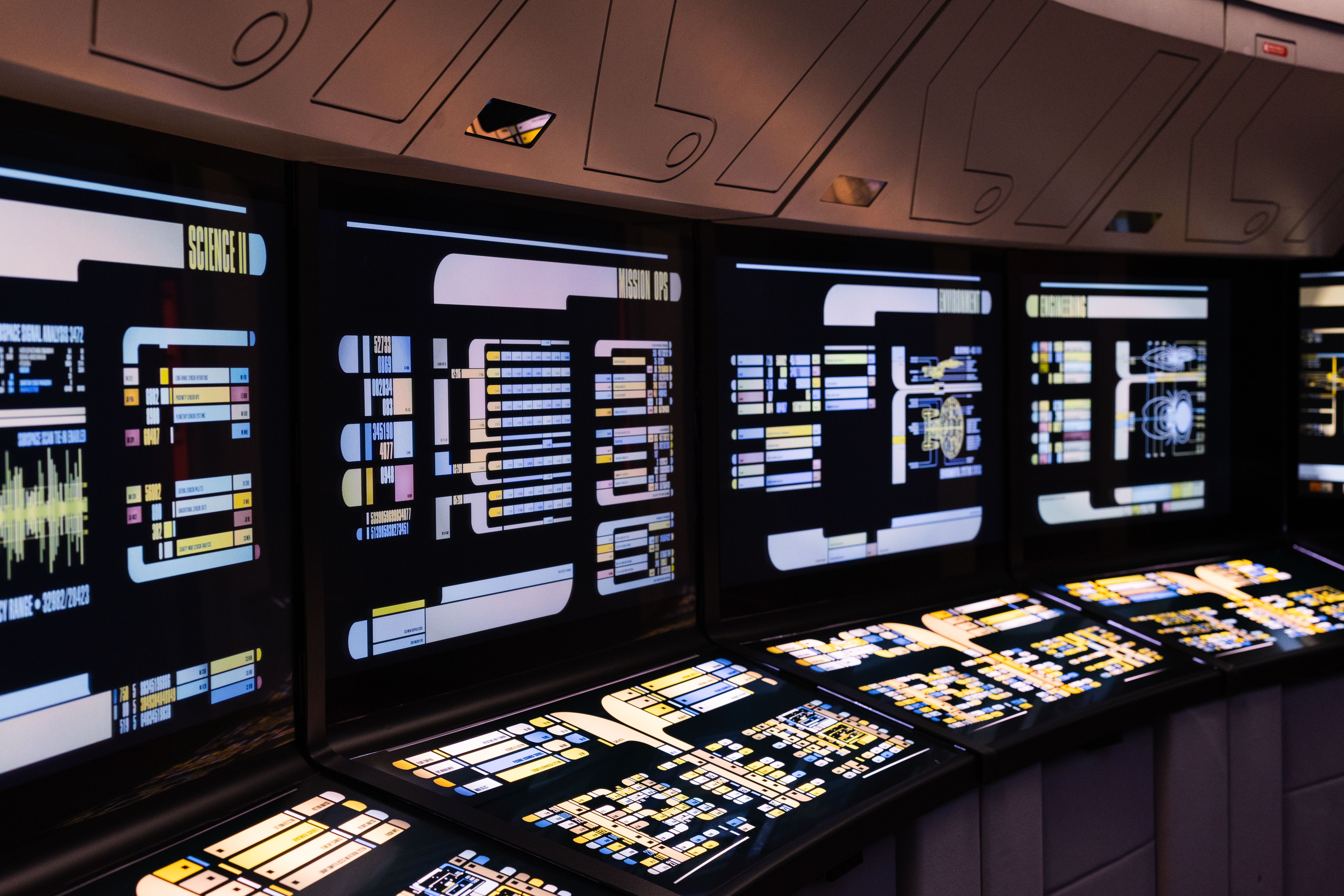 Futuristic command center with illuminated screens representing automated security orchestration